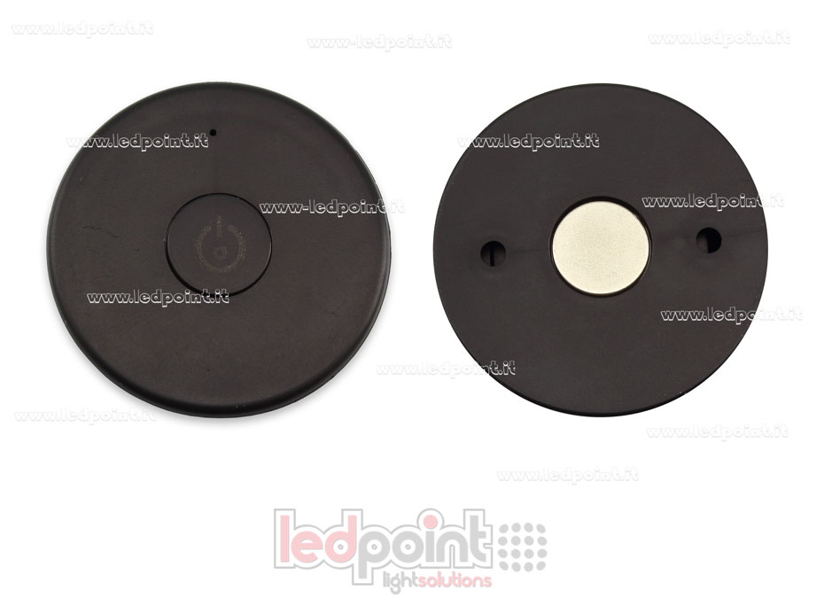 Télécommande portable monochromatique, noire, RF 2.4G, avec aimant à l'arrière et trous pour montage mural Télécommande portable monochromatique, noire, RF 2.4G, avec aimant à l'arrière et trous pour montage mural